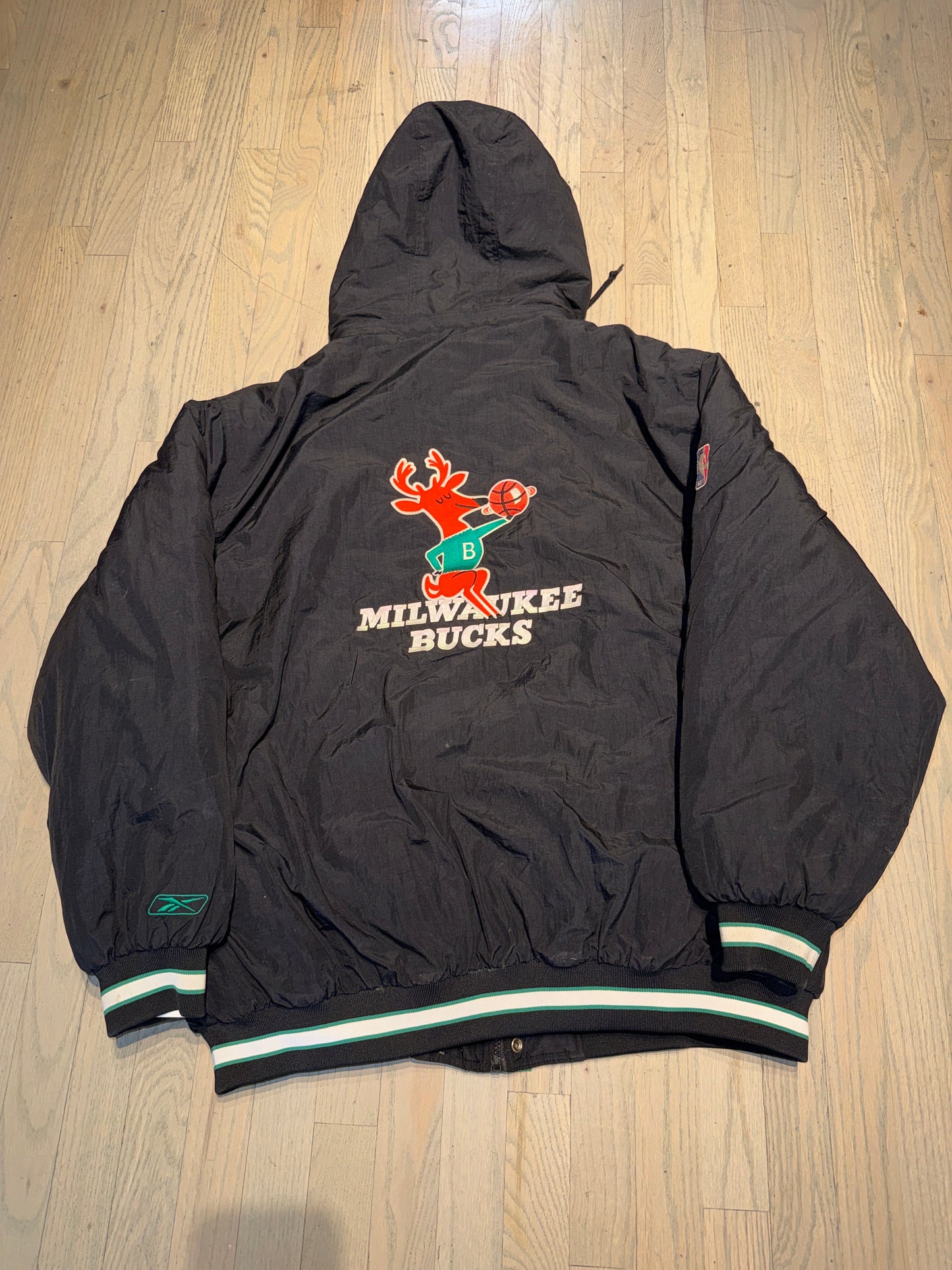 This vintage Reebok Milwaukee Bucks puffer jacket