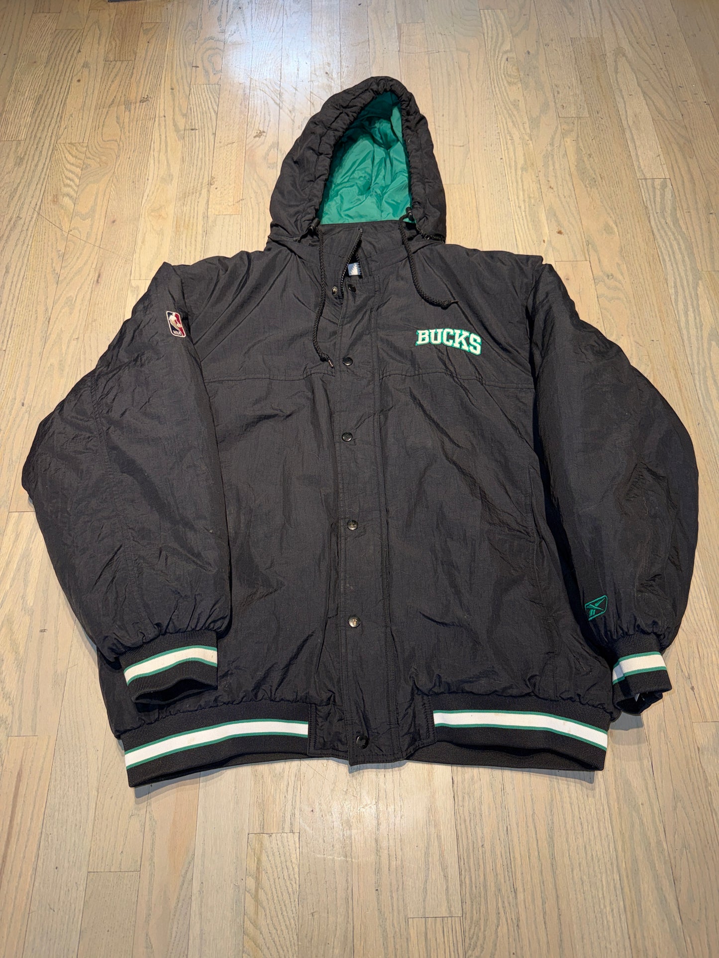This vintage Reebok Milwaukee Bucks puffer jacket